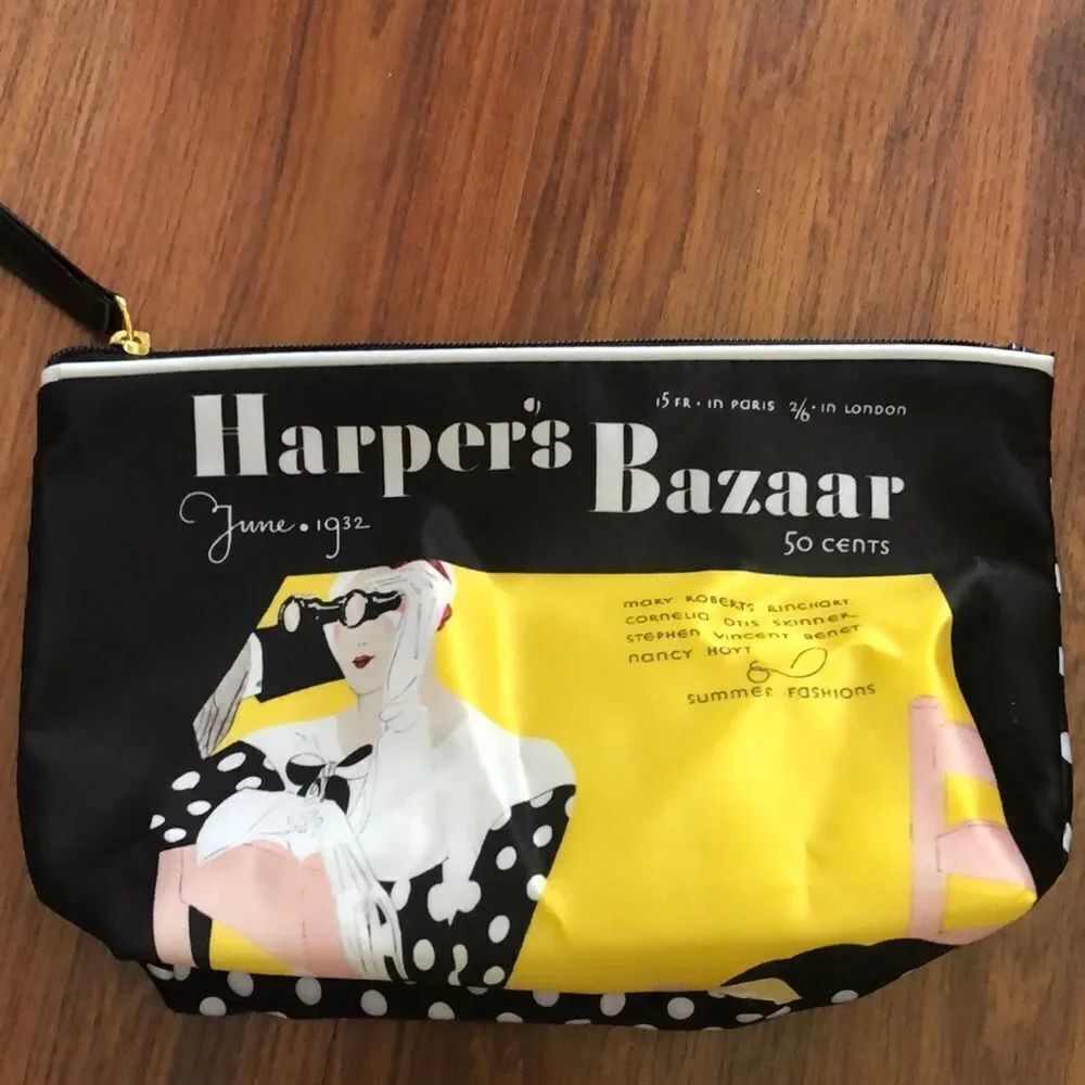 Estee Lauder Harpers Bizarre black and yellow cosmetic case.